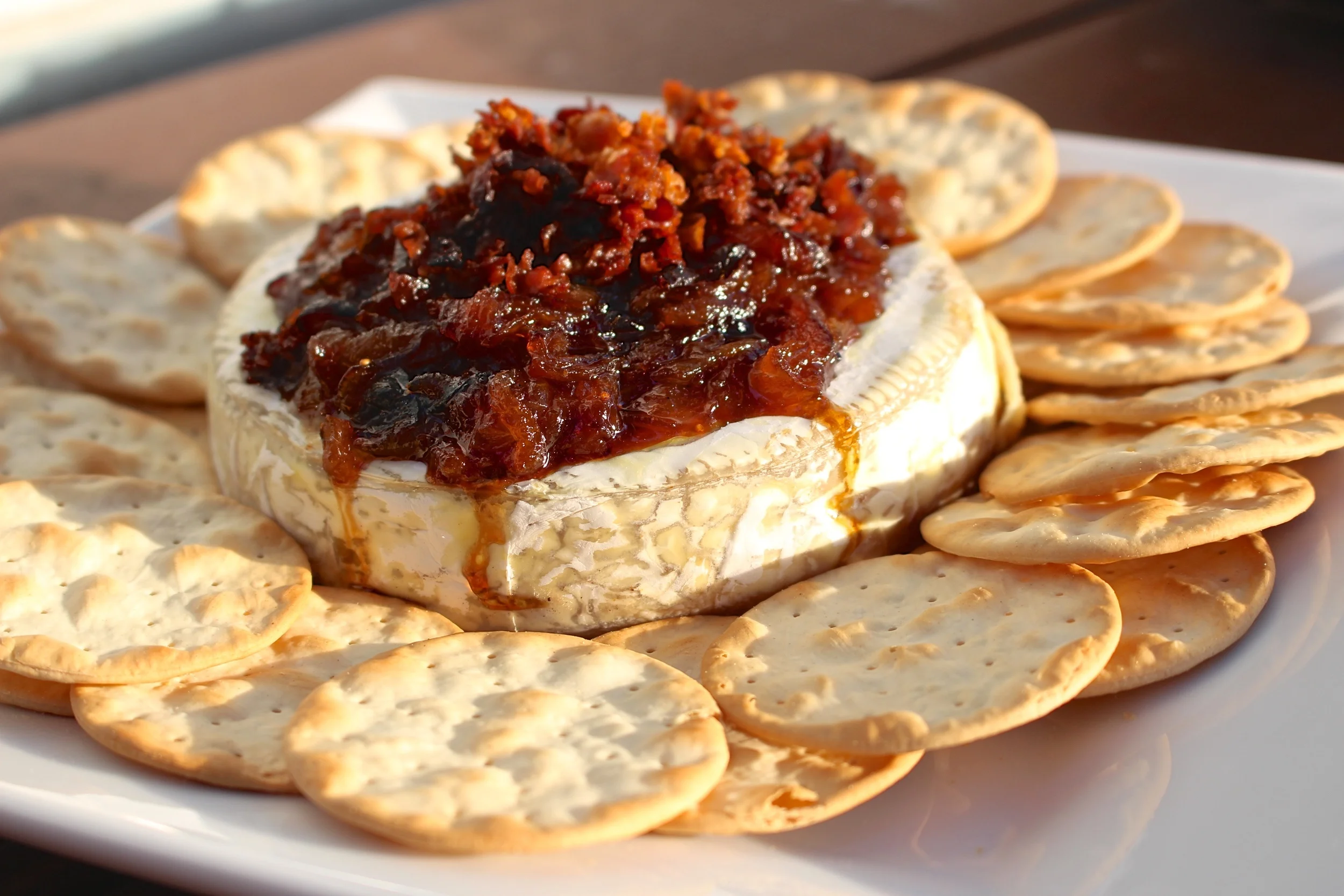Easy and Elegant New Years App: Baked Brie with Caramelized Onions, Fig, & Pancetta