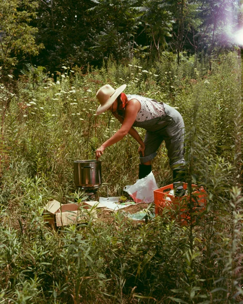 Heidi Norton pouring wax on Cobra Lily Mountain , 2011. Pigment print, 40 x 32 inches.