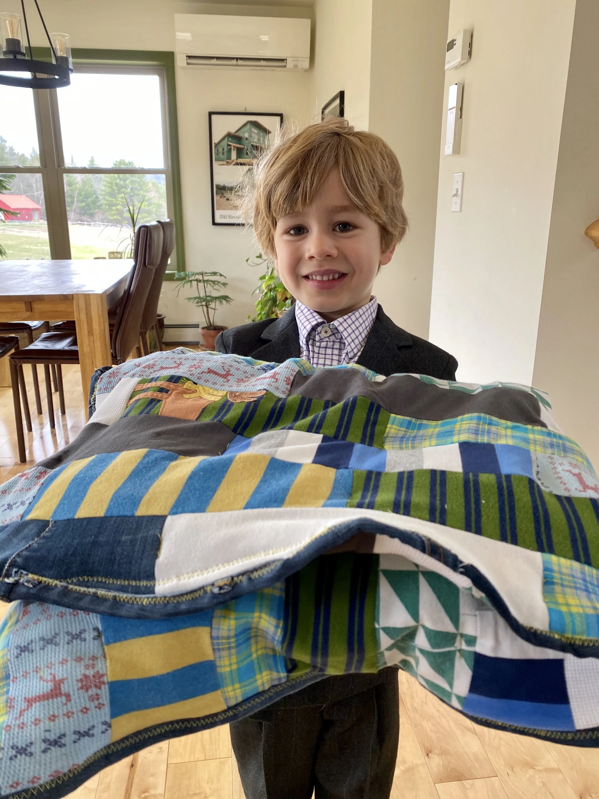 Kasper holding Quilt.JPG