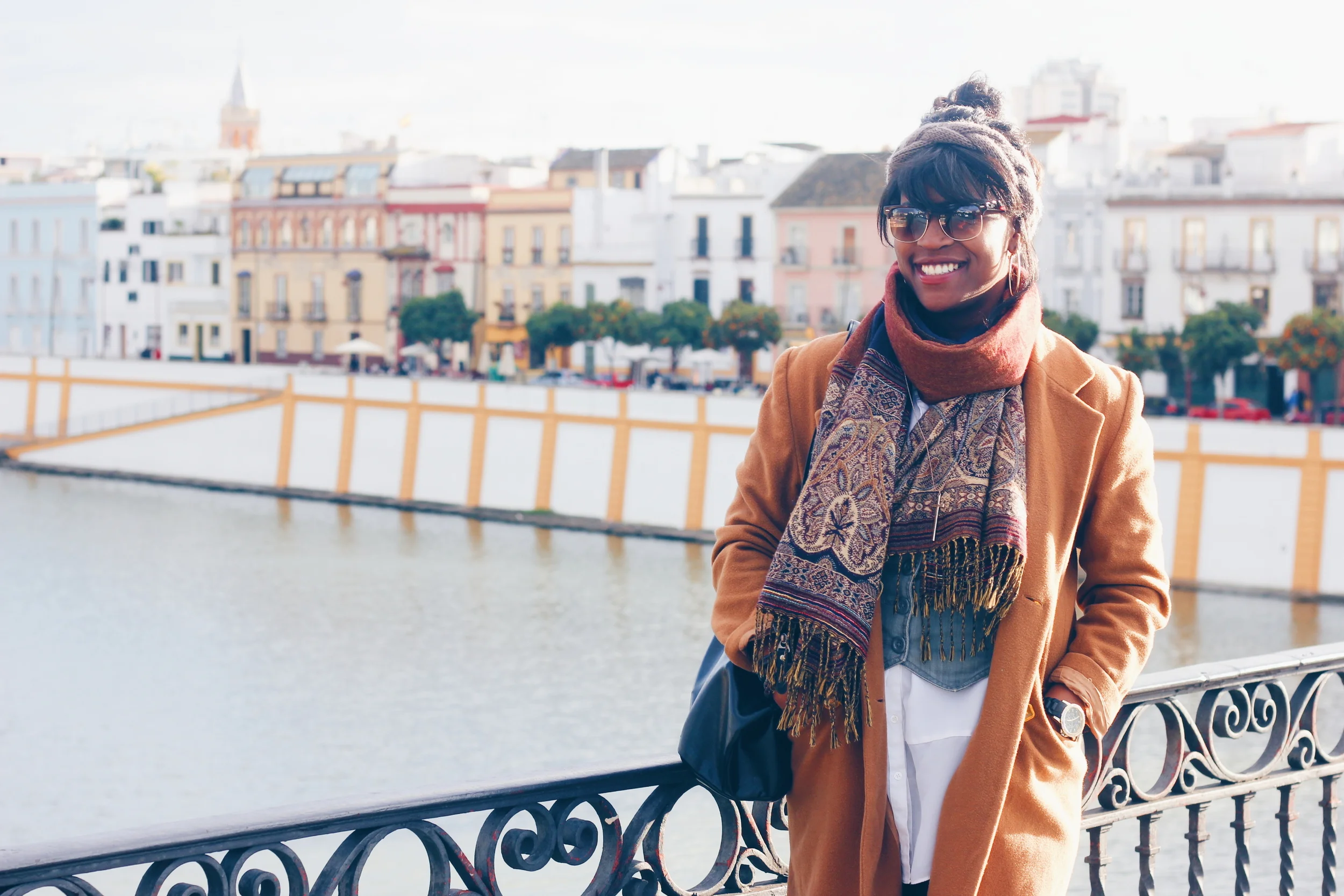 Glo taking in the riverside views of Seville, Spain