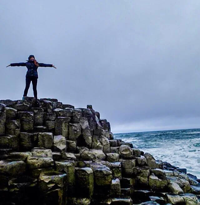 Mel braving the winds at Giant's Causeway, Ireland.