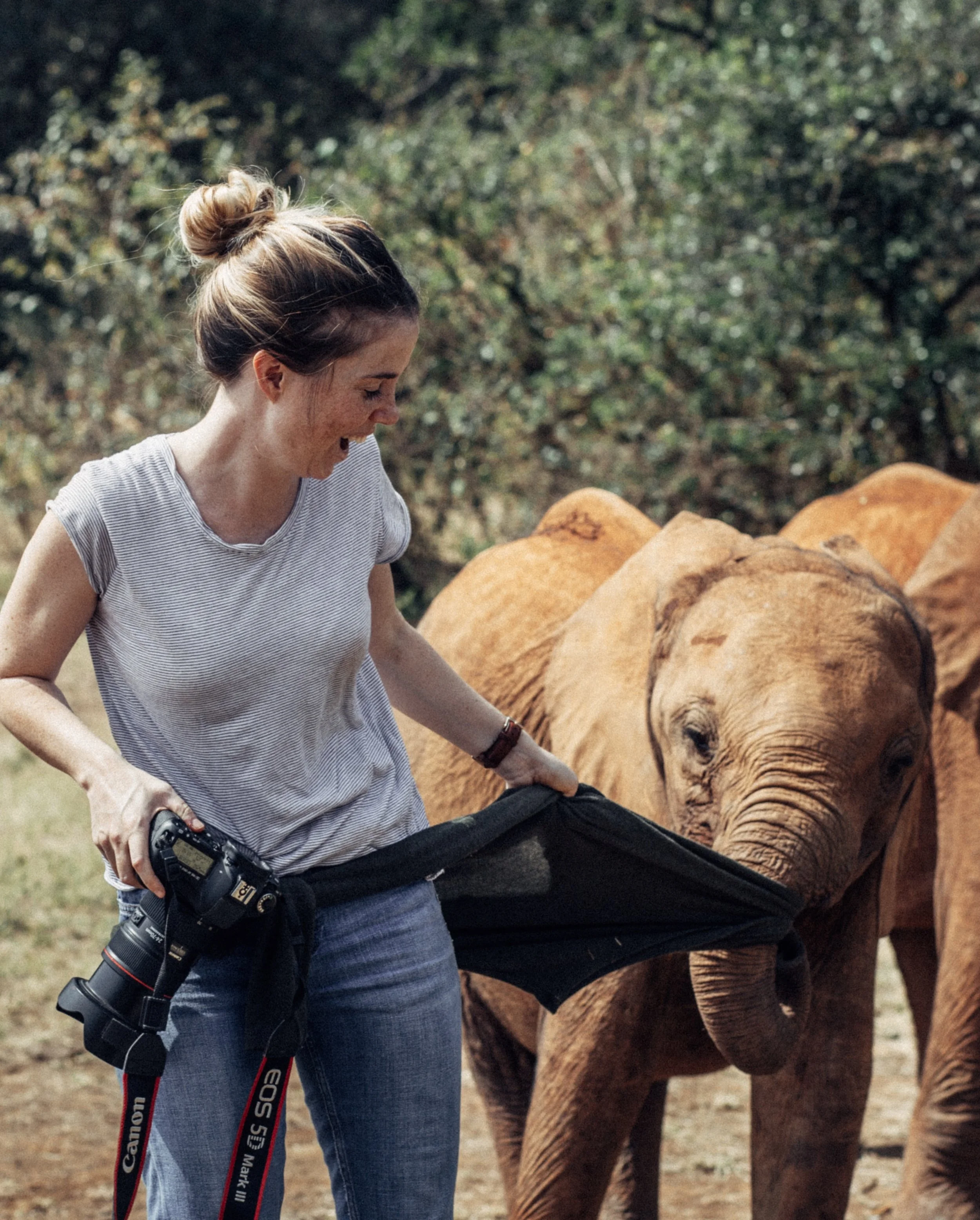 Freya making new (cheeky!) friends while working at the Sheldrick Wildlife Trust, Kenya
