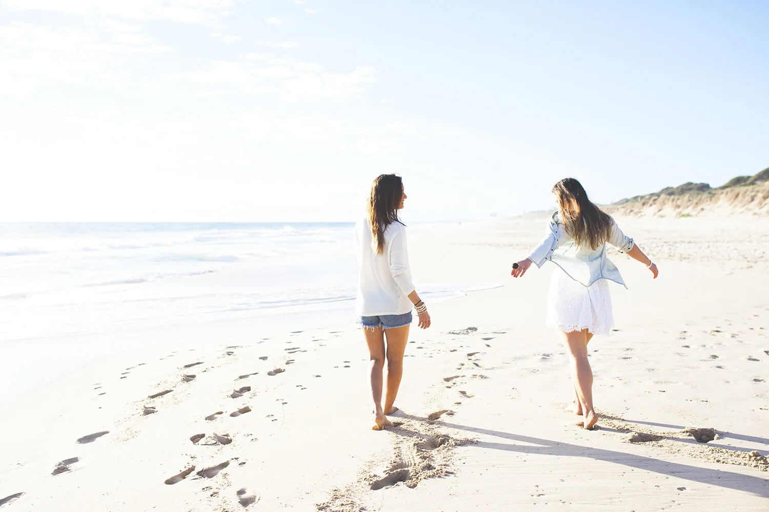 Ash & Axel taking a beach break while on one of their many road trips