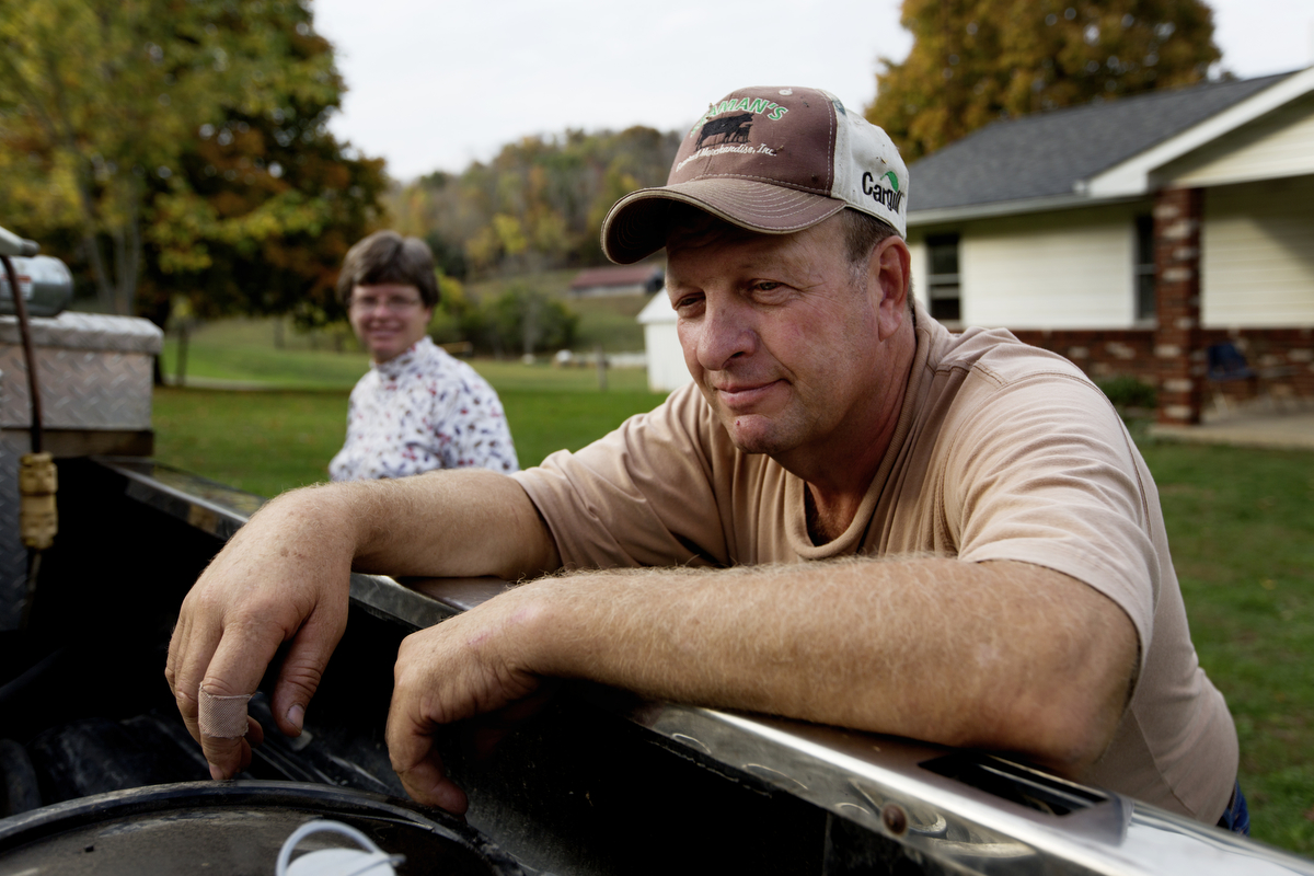  Paul Southall and his wife Rhonda take a late afternoon break from doing farm chores.&nbsp; 