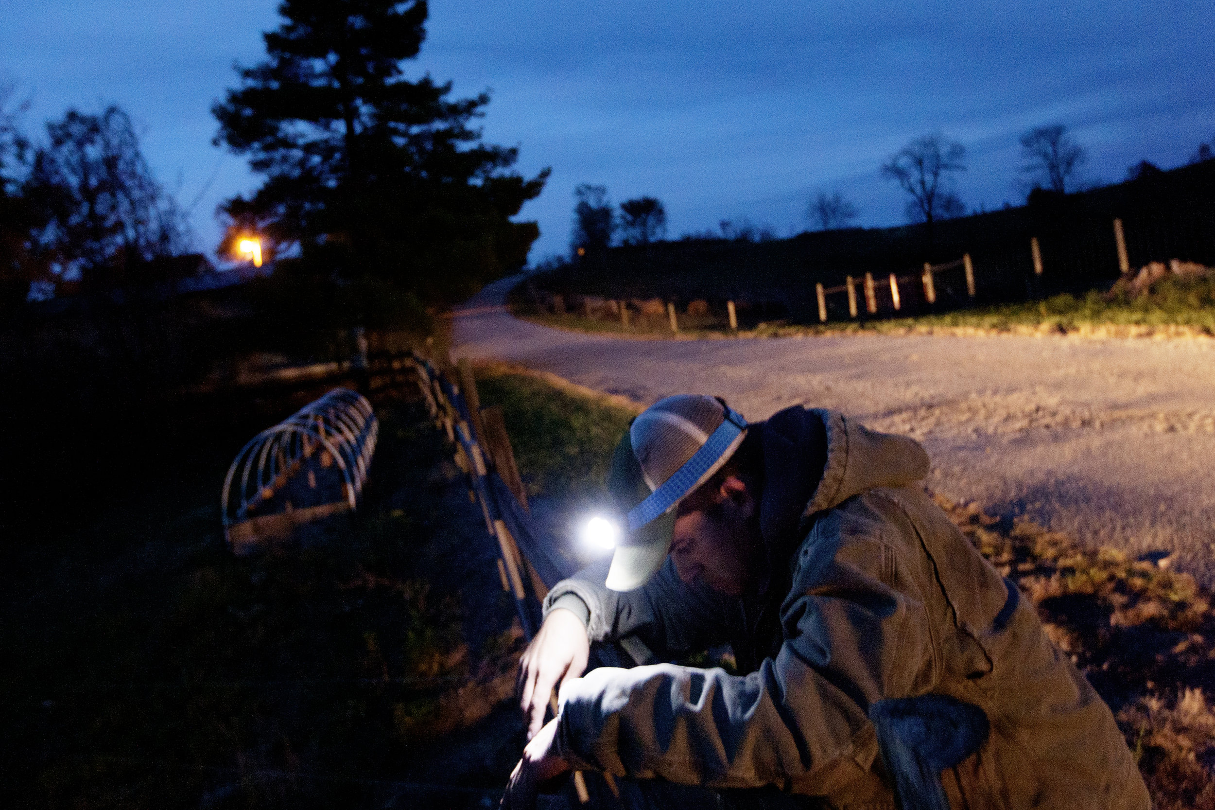  Reitano takes a moment to relax during nightfall after completing his evening chores.&nbsp; 