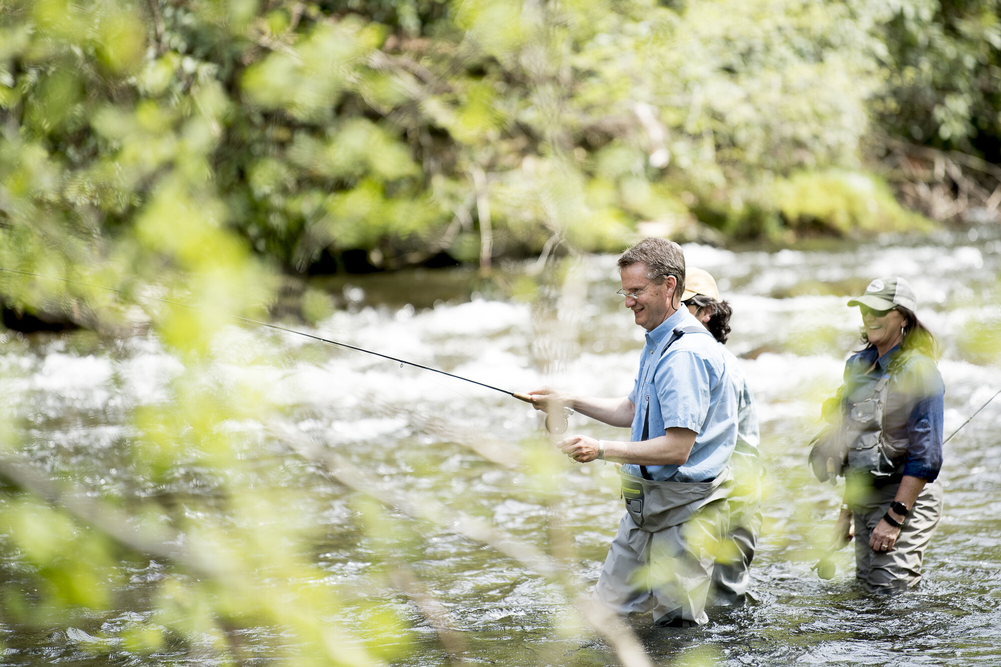  U.S. Rep. Tim Burchett fly fishes in the Little River with Ian and Charity Rutter, of R&amp;R Fly Fishing, at Metcalf Bottoms Picnic Pavilion in the Great Smoky Mountains. Congressman Burchett was fly fishing in the Smokies to shed light on backlogg