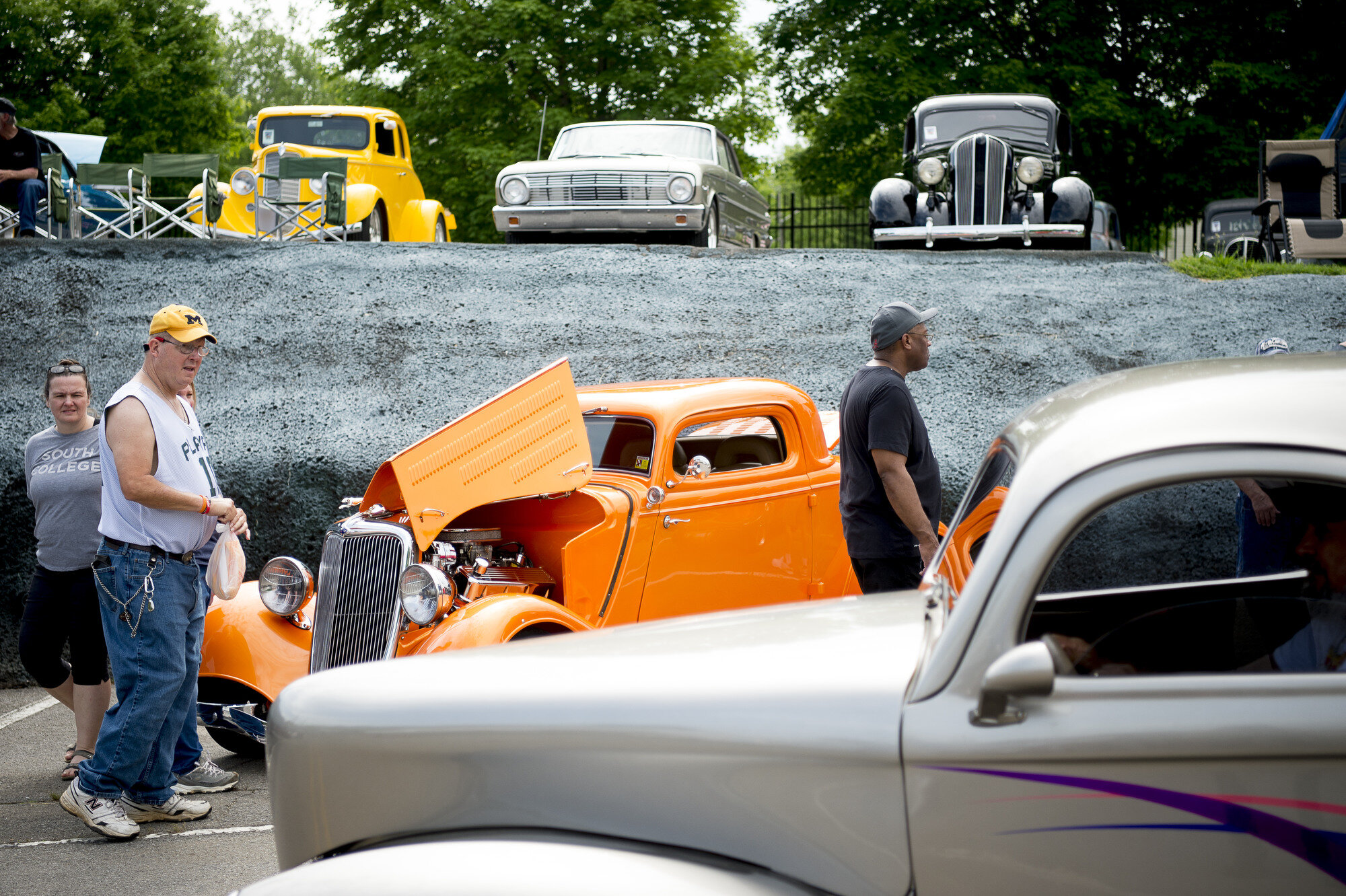  Car enthusiasts walk at the 45th annual Street Rod Nationals South at Chilhowee Park in Knoxville, Tennessee on Saturday, May 4, 2019. 