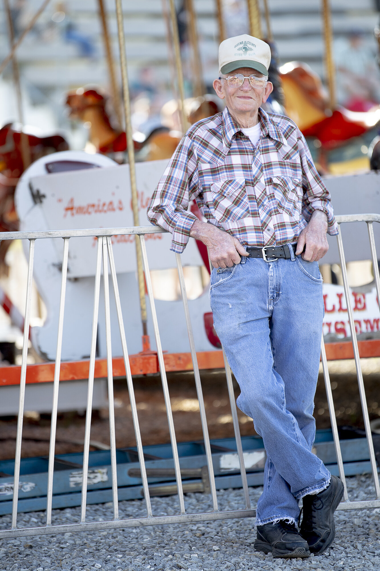  Clifford Darnell, of Greenville, takes in the scenes of the Greene County Fair at the County Fairgrounds in Greeneville, Tennessee. Darnell was visiting the fair with his four grandchildren and planned to eat a cheeseburger while enjoying the sights