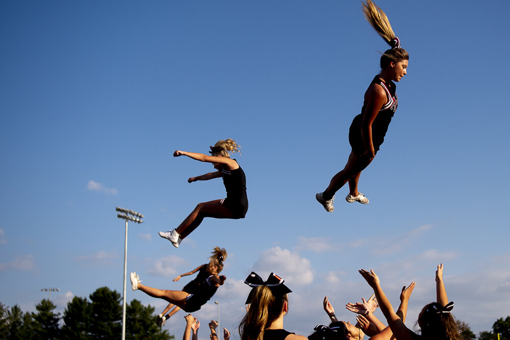  Cheerleaders perform a stunt during a football game between Jefferson County and Morristown West at Jefferson County High School in Jefferson City, Tenn. 