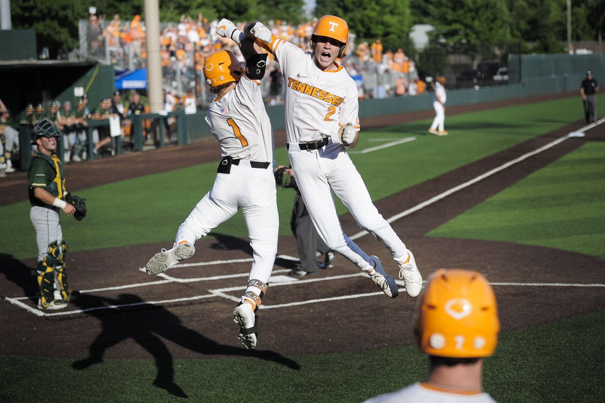  Tennessee's Max Ferguson (2) celebrates a home run hit with Tennessee's Drew Gilbert (1) at the NCAA Baseball Tournament Knoxville Regional at Lindsey Nelson Stadium in Knoxville. 