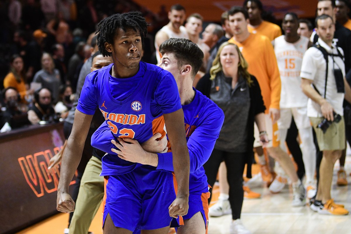  Florida guard Tyree Appleby (22) is removed from an altercation by a teammate following Tennessee’s 78-71 win at Thompson-Boling Arena in Knoxville. A dispute broke out during the post-game handshake after Florida players made comments to Tennessee 