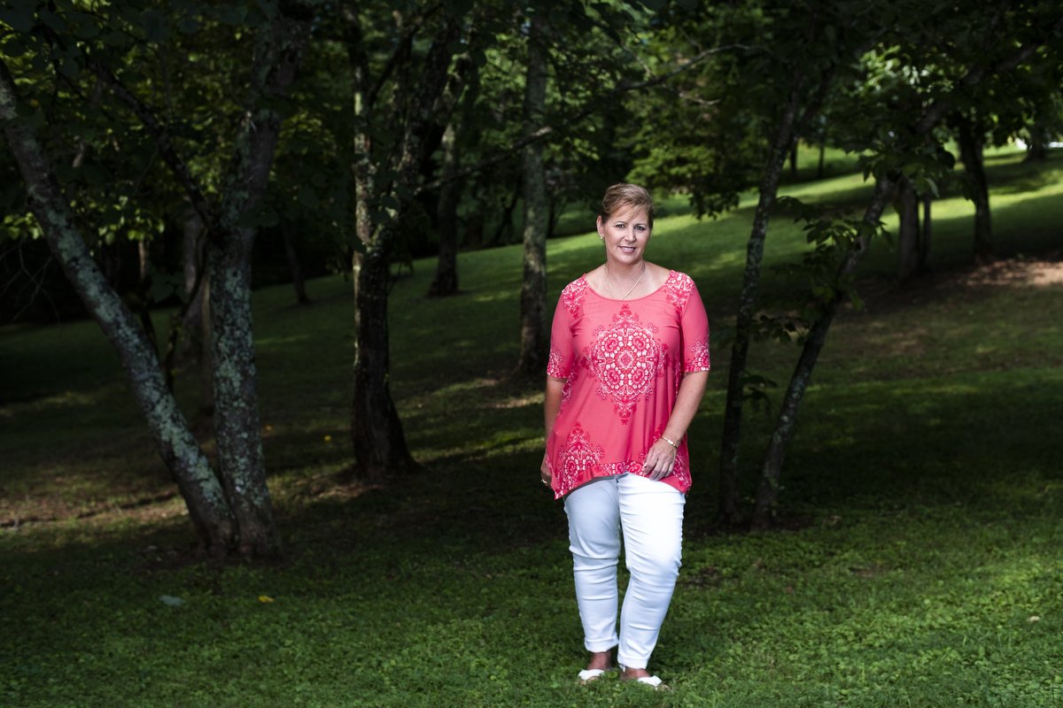  Kim Beard stands in her backyard near where she was bit by a tick at her home in Greenback, Tenn. Beard suffers from Alpha Gal, a tick-borne disease which prevents her from consuming meat without breaking out in hives, welts and excessive itching. R