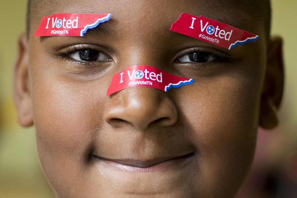  Jy'Zayiah Davis, 9, of Knoxville, wears "I Voted" Tennessee stickers on his face while at Fair Garden Elementary School while his mom votes on Election Day in Knoxville. Voters were voting for Tennessee's next governor, U.S. senator, congressional r