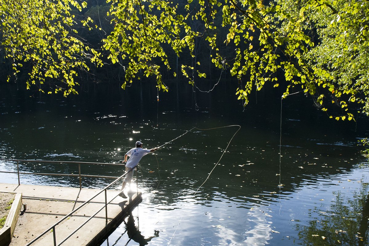  Matt Prentice, of Knoxville, fly fishes for large mouth bass on the Clinch River in Clinton, Tennessee. 