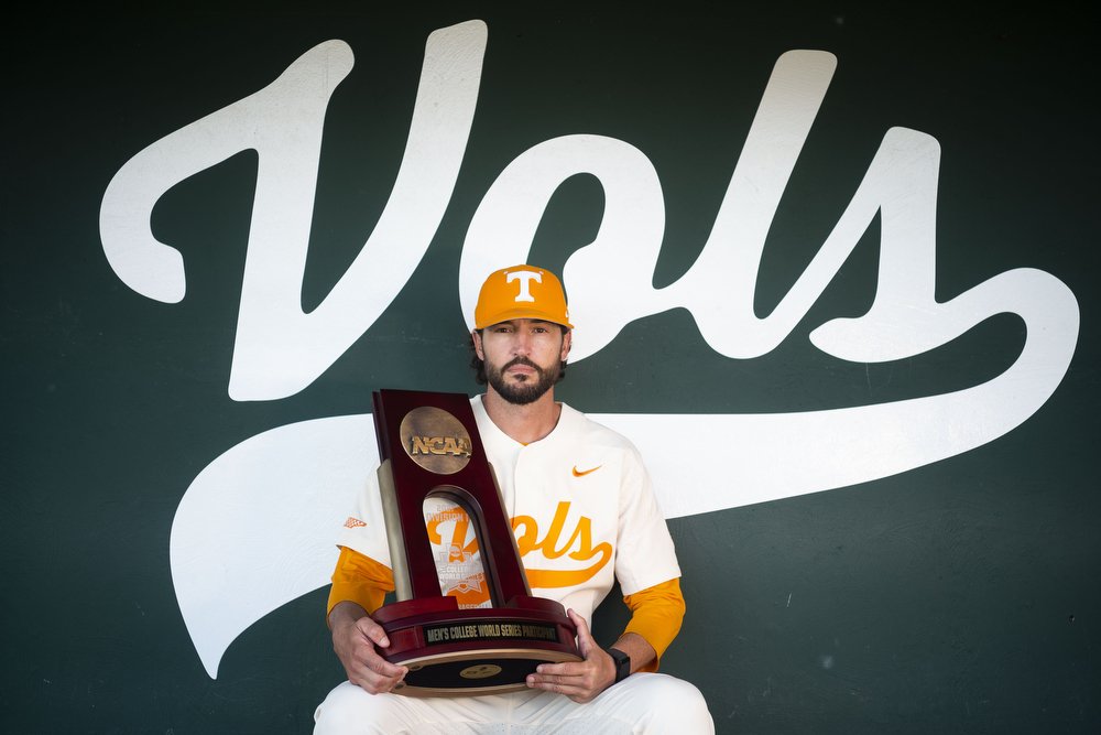  Tennessee baseball head coach Tony Vitello, Knox News Sportsperson of the Year, poses for a portrait in front of the College World Series marker in right field, which now lists its 2021 participation, at Lindsey Nelson Stadium. 