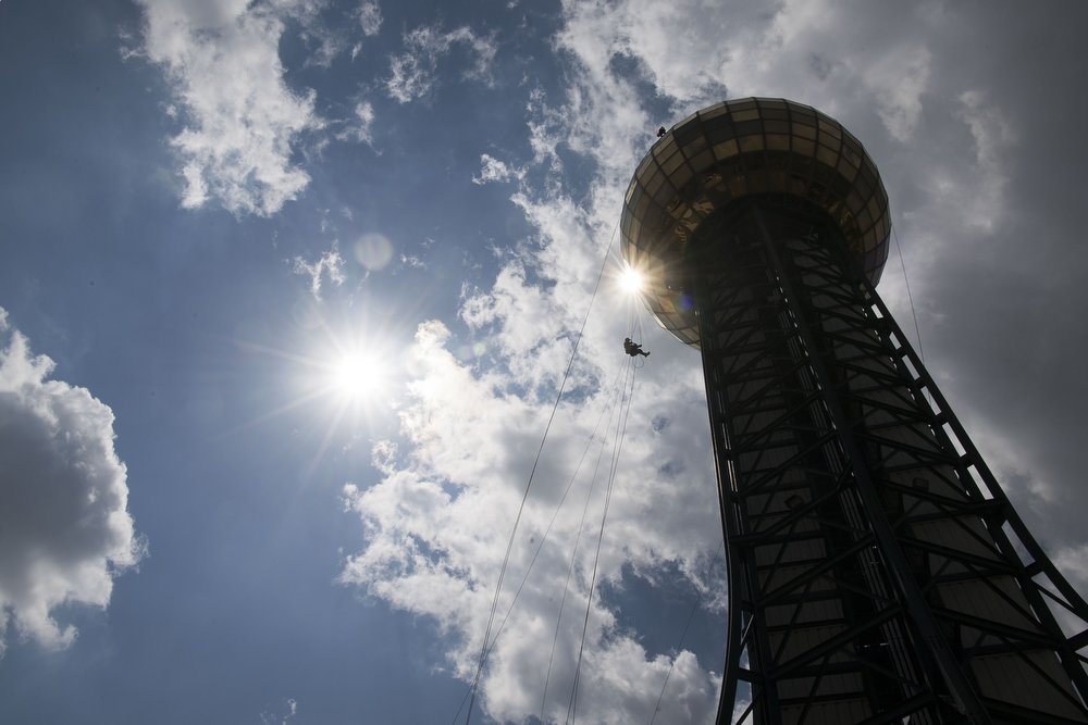  Brian Woodruff, from Apex Window Cleaning, ropes down from cleaning the windows of the Sunsphere in Knoxville. Apex cleans the famous Knoxville landmark twice a year using nothing but water and dish soap, a job that typically takes two days. 