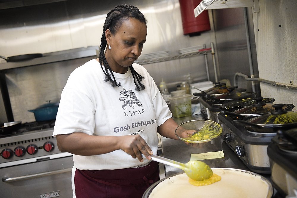  Gosh Ethiopian Restaurant owner Terri Woldemichael often works alone in the kitchen because finding good help has proven difficult. Constrained by time and lack of workers, the restaurant only operates for dinner four nights a week. 