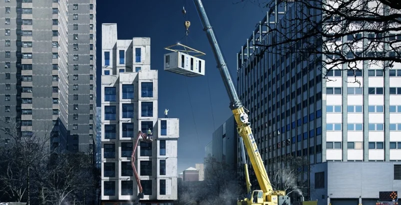 The concrete and steel modular units at My Micro NY are currently being stacked and bolted together. Renderings courtesy nArchitects