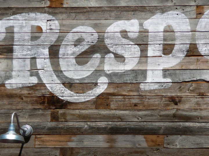 distressed hand lettering on barnwood