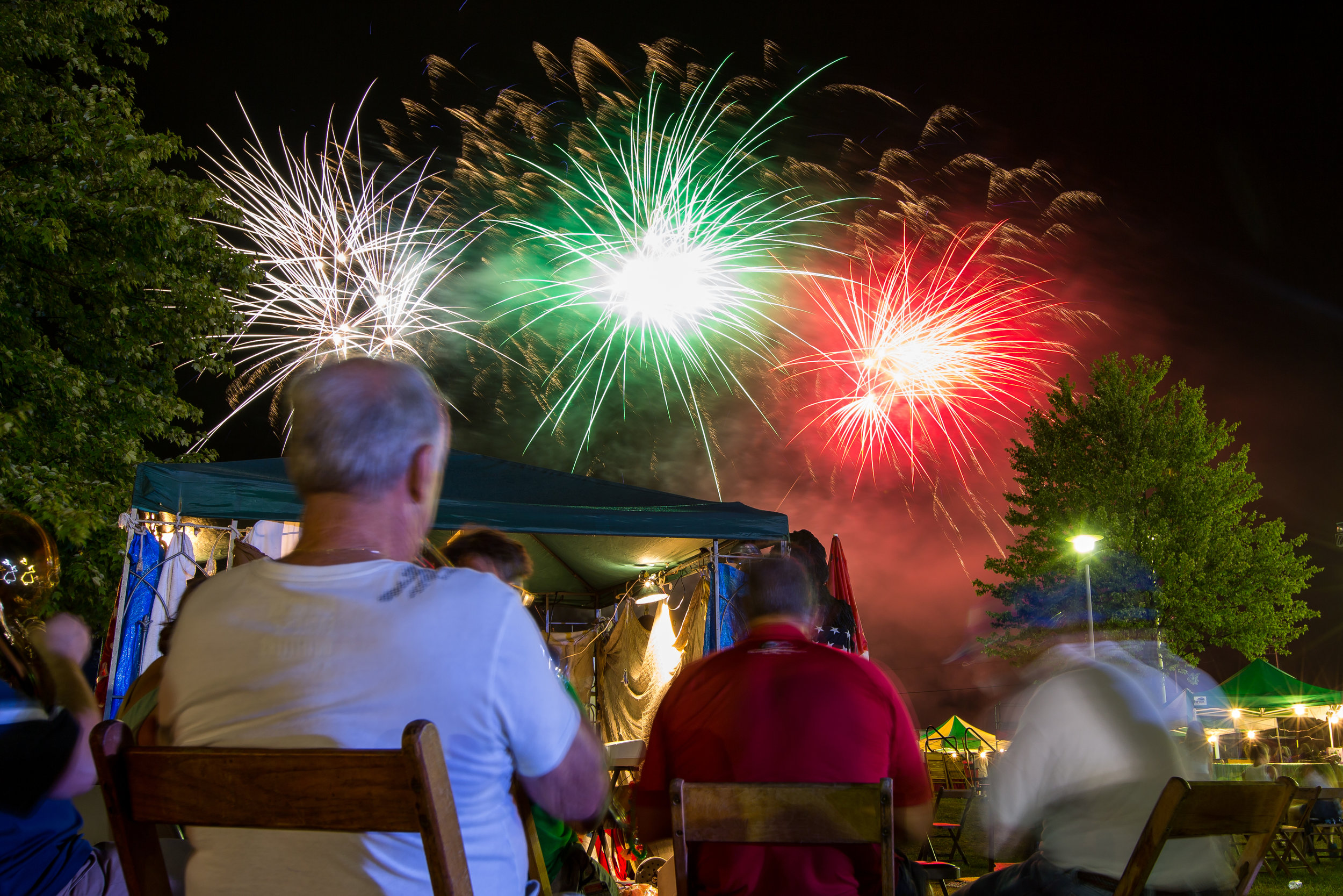  Henry Bufalini, left, plays his trumpet with the rest of the Ballaba band while fireworks go off concluding the second day of the 91st San Rocco Festa in Aliquippa on Saturday. The festival, which originated in the town of Patrica, Italy, took place