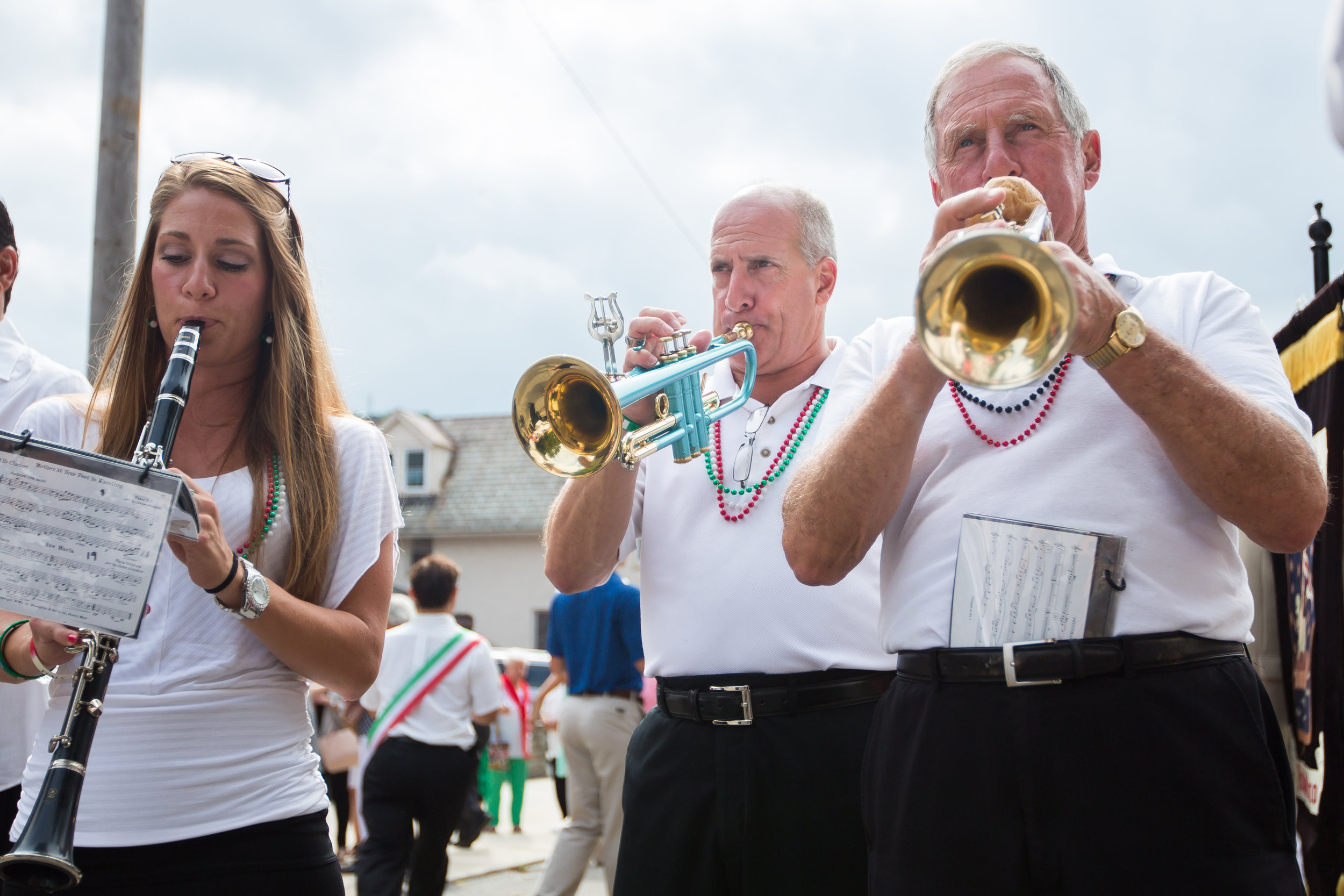  Henry Bufalini, right, his son David, center and his daughter Natalee play with the San Rocco Festa Band during the procession through the streets of Aliquippa on Sunday morning. Henry, David and Natalee are the only three generation family members 