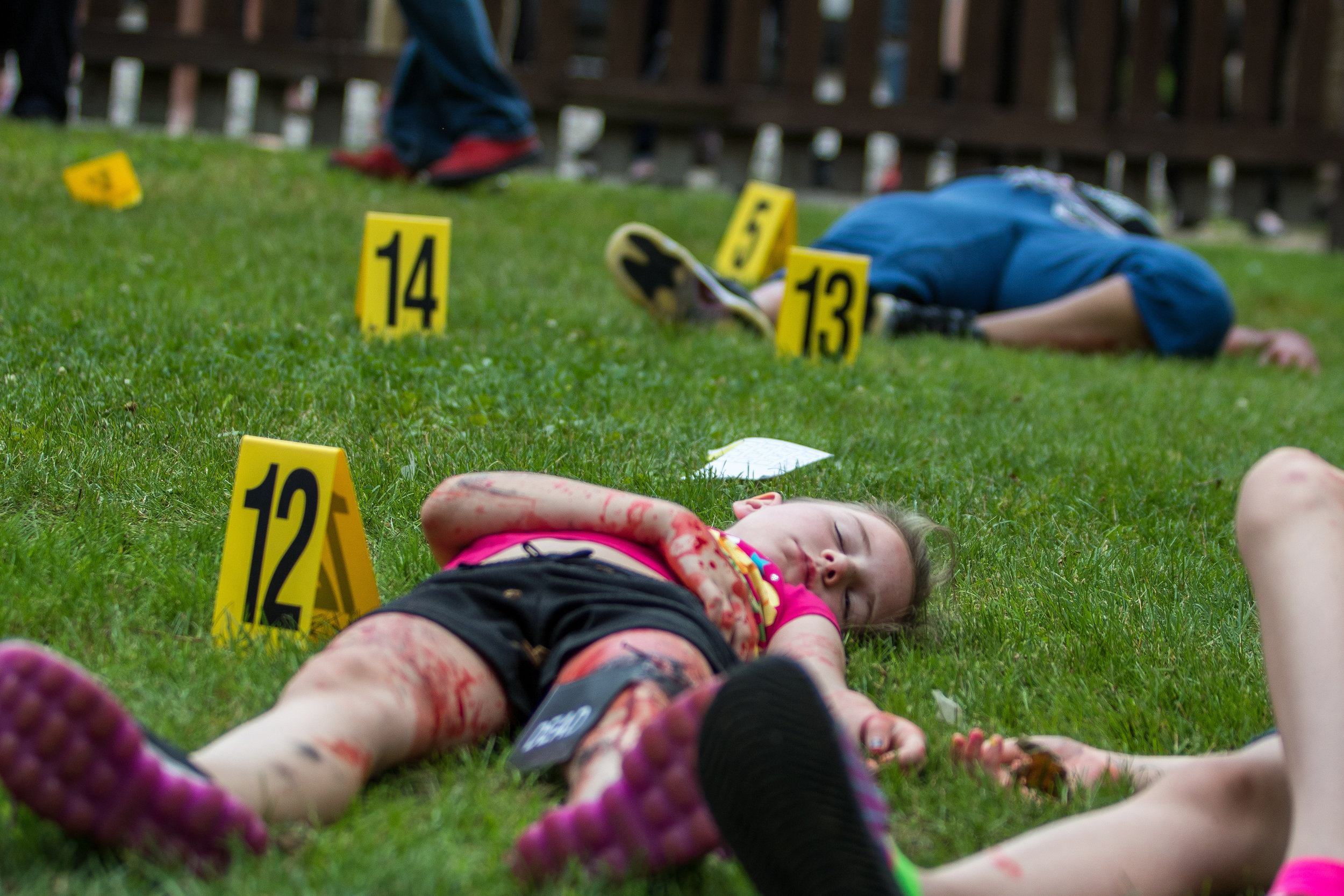  Actors lie on the ground playing dead during the aftermath of a suicide bombing simulation hosted by the Pittsburgh Technical Institute in Oakdale on Wednesday morning. The drill consisted of 150 nursing and criminal justice students, as well as pro