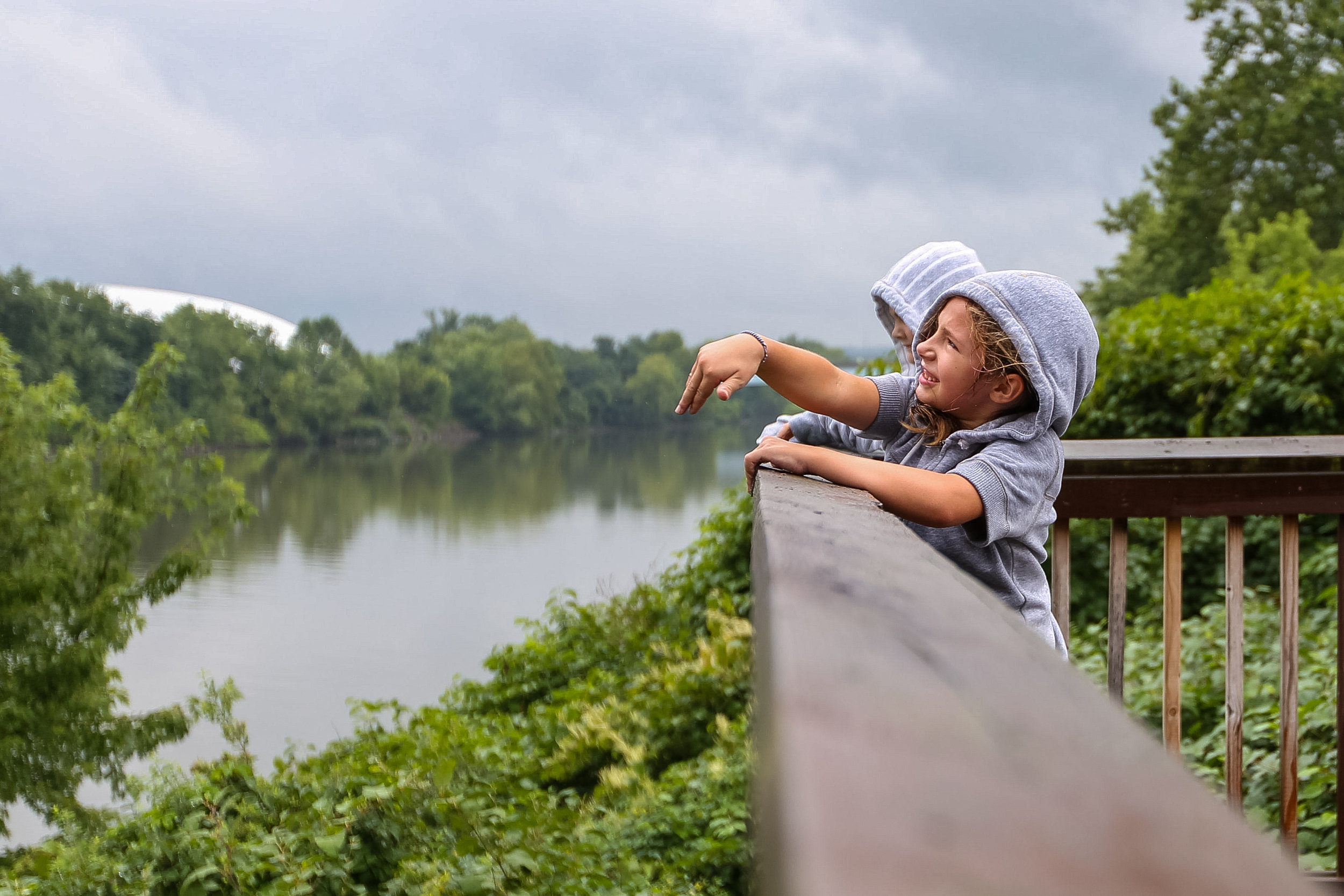  Vega Meredith, 8, watches as she throws a rock into the Ohio River from an overlook in Coraopolis on Wednesday afternoon.  