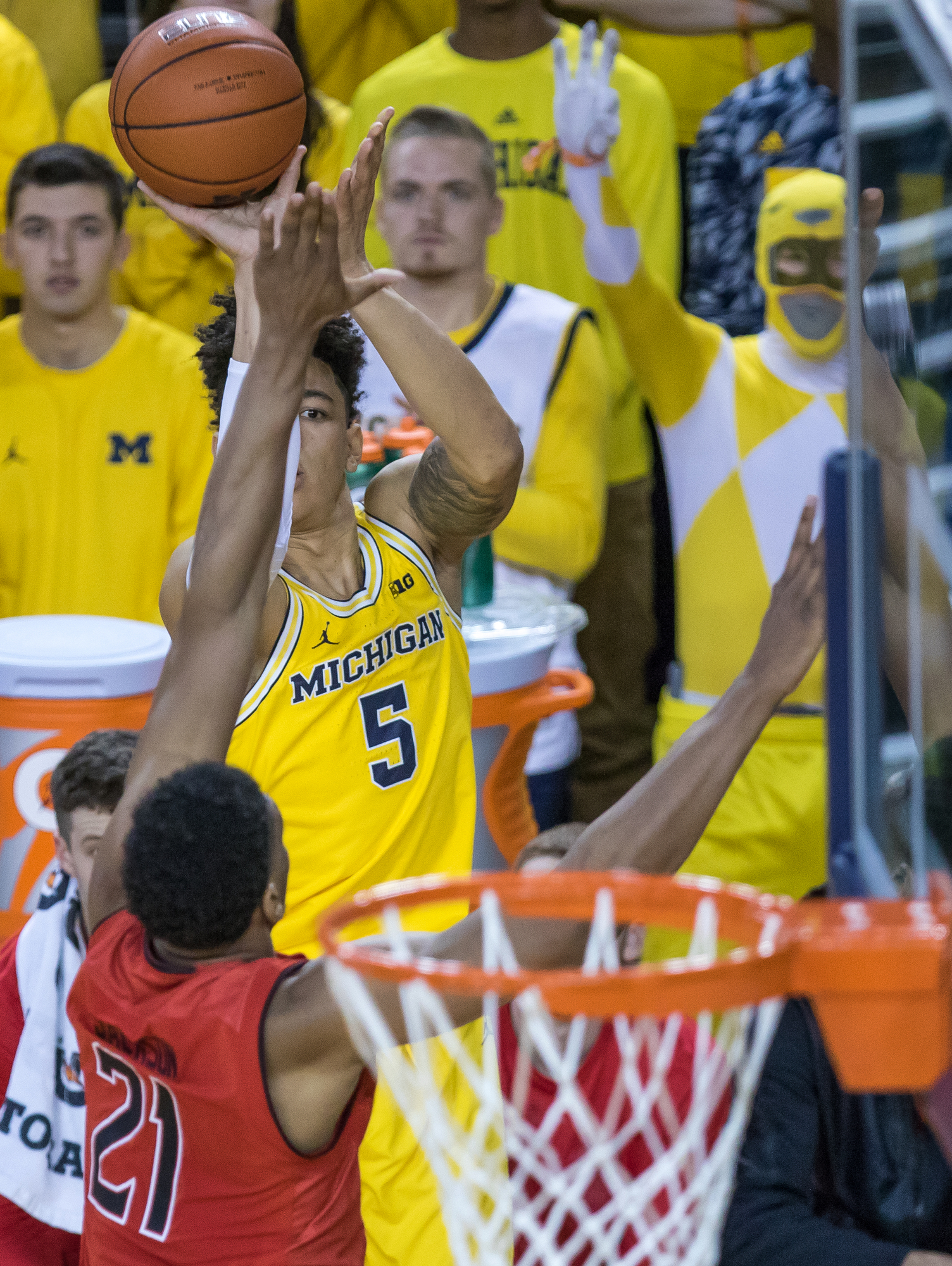  Michigan�s D.J. Wilson (5) shoots a three-point-shot during the first half of play against Maryland at the Crisler Center on Saturday, January 7, 2017. The Michigan Wolverines lost to the Maryland Terrapins 70-77. Matt Weigand | The Ann Arbor News 