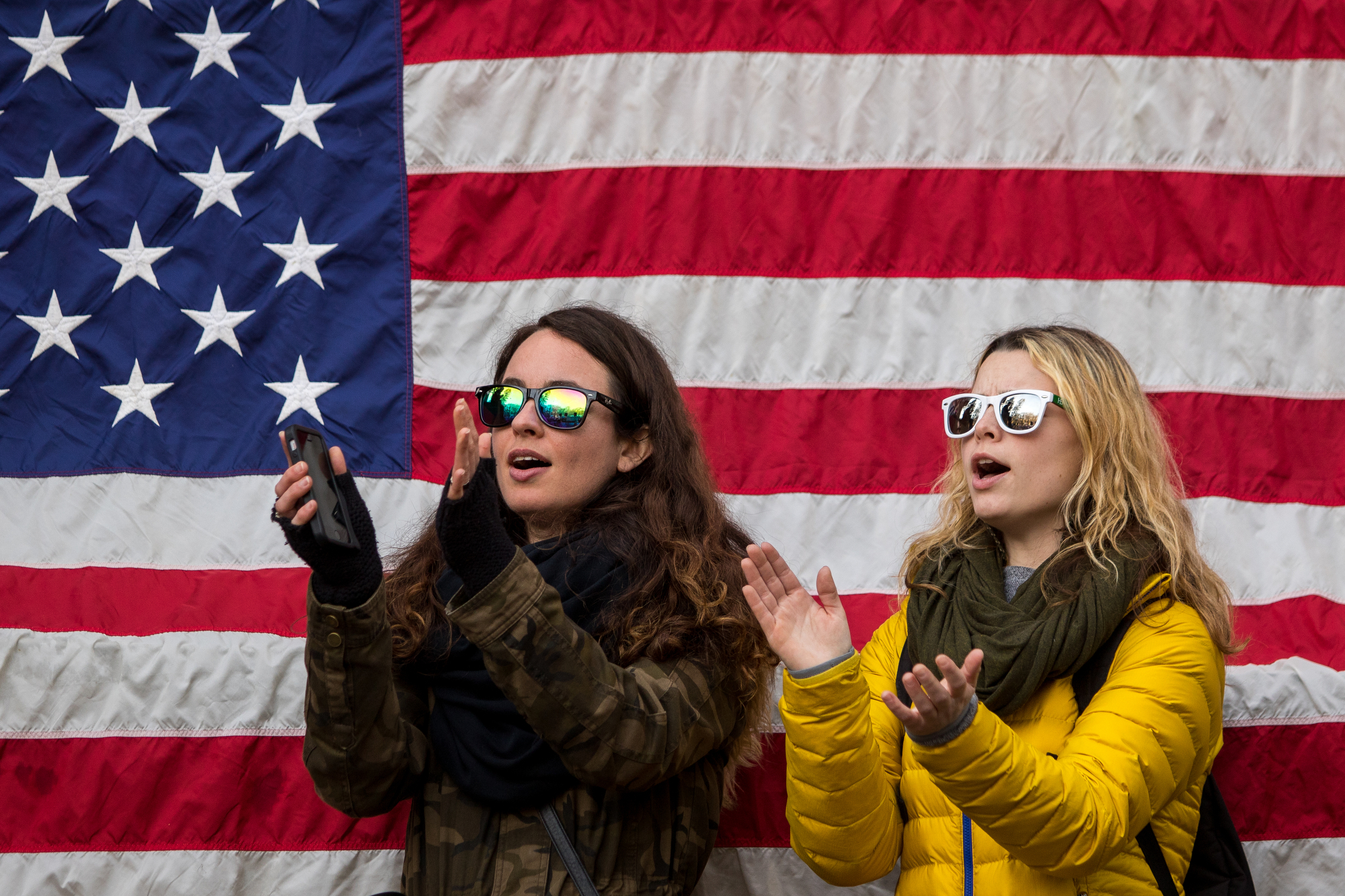  Mecca McNulty, left and Audrey Torma cheer at the Diag at the University of Michigan during the Women's March on Saturday, January 21, 2017.  The march was one of several throughout the country and drew over 6,000 people. Matt Weigand | The Ann Arbo