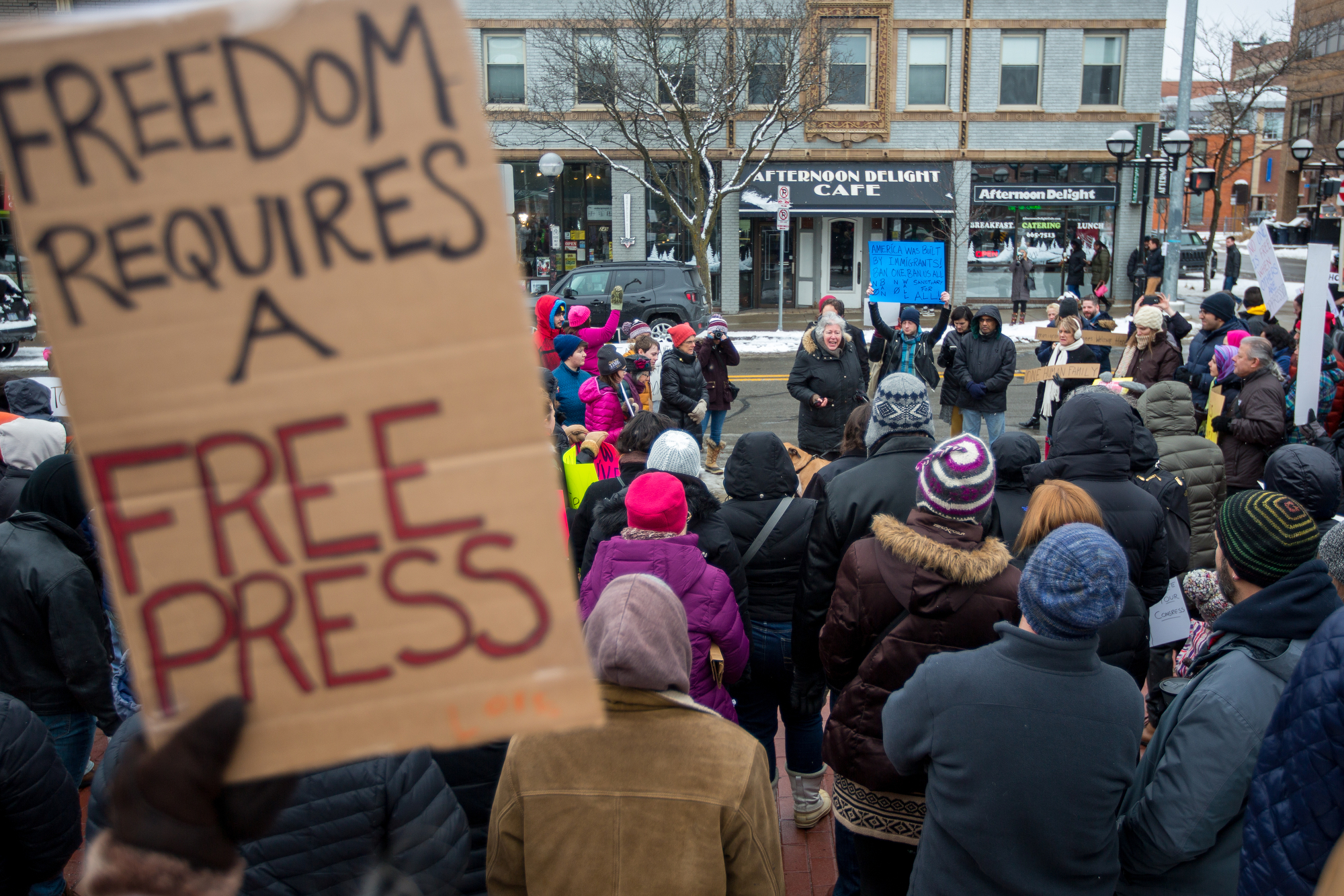  People gather outside of the federal Building in downtown Ann Arbor to protest President Trump's anti-immigration policy on Sunday, January 29, 2017. About 200 people attended the protest. Matt Weigand | The Ann Arbor News 