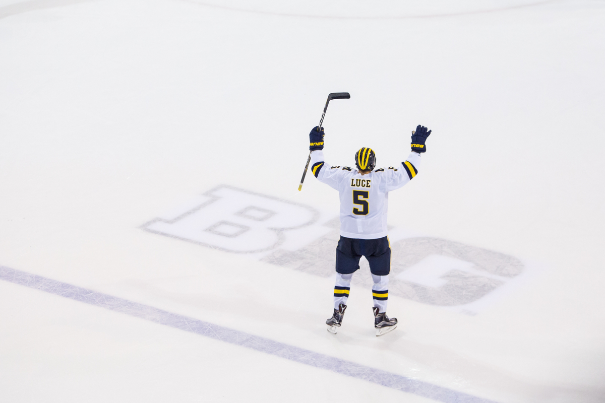  Michigan's Griffin Luce (5) celebrates after scoring Michigan's only goal during the last seconds of the matchup against Michigan State at Yost Ice Arena on Saturday, February 11, 2017. The Michigan State Spartans beat the University of Michigan Wol