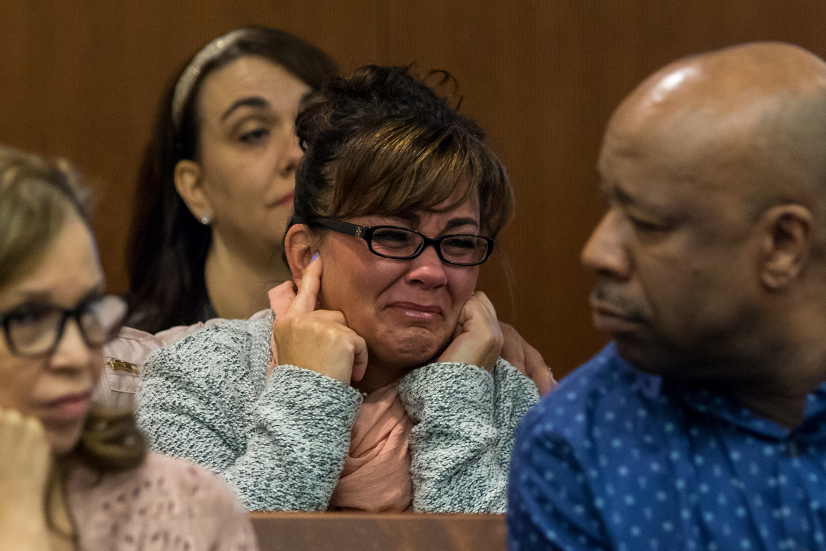  People sitting in court room three react during Michigan State Trooper Patrick Gallagher's testimony during a preliminary examination in the court case for Marcus Palmer at the 15th District Court on Friday, March 24, 2017. Palmer is accused of murd