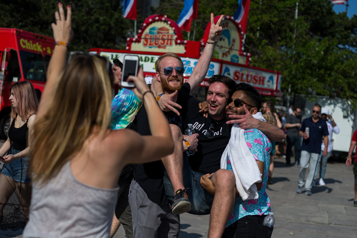  Festival goers take a photograph at Hart Plaza in downtown Detroit for day one of Movement Electronic Music Festival on Saturday, May 27, 2017. Over 100 artists are scheduled to perform over the three-day Memorial Day festival. Matt Weigand | The An