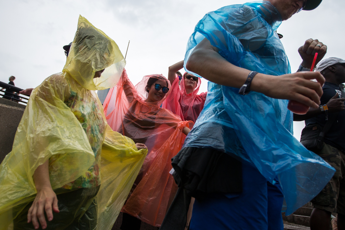  People dance in rain ponchos at the Main Stage during Francesca Lombardo's set at Hart Plaza in downtown Detroit for day two of Movement Electronic Music Festival on Sunday, May 28, 2017. Over 100 artists are scheduled to perform over the three-day 