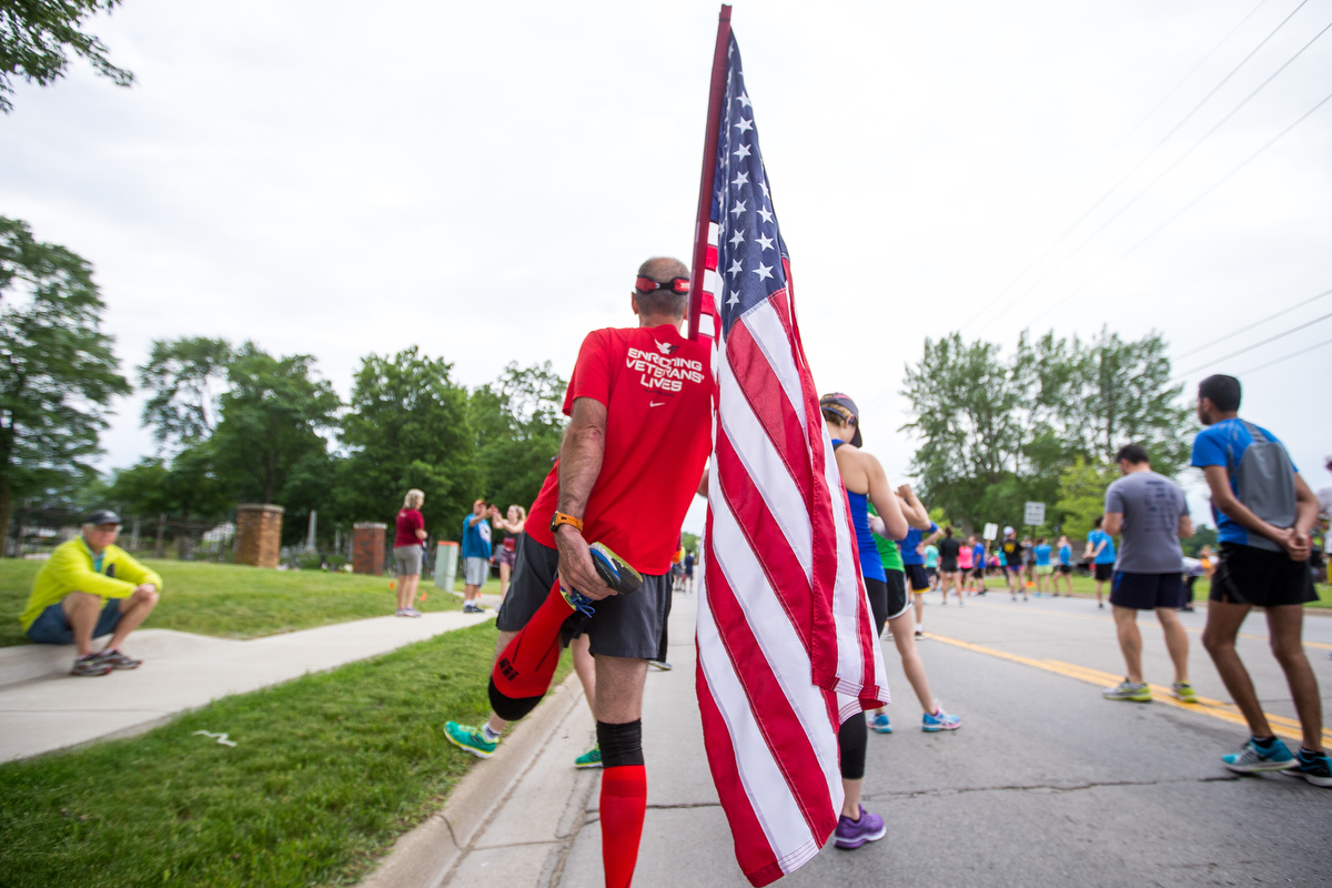  Jeff Walters of Dearborn Heights stretches before the beginning of the Dexter to Ann Arbor half marathon on Sunday, June 4, 2017. Thousands turned out for the event, which is in its 44th year. Matt Weigand | The Ann Arbor News 