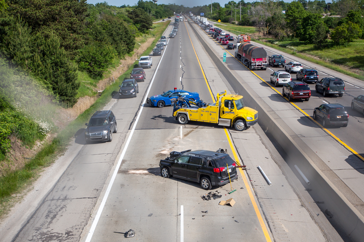  A car sits on the roadway after a three-car collision on westbound I-94 near Ann Arbor Saline Road on Thursday, June 8, 2017. No major injuries were reported. Matt Weigand | The Ann Arbor News 