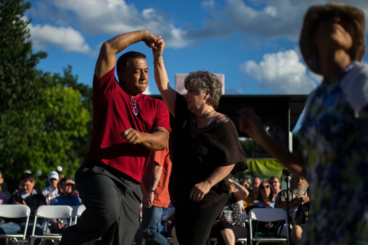  Two people dance while listening to Tumbao Bravo, a Latin jazz band, at Ingalls Mall during Top of the Park on Saturday, June 24, 2017. Matt Weigand | The Ann Arbor News 