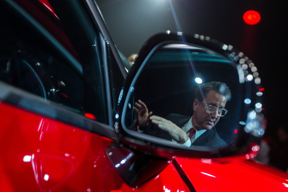  James Bell, Director of Corporate Communications for Kia, talks about the Kia Stinger, Kia's fastest production car, as it is unveiled at the Russell Industrial Center during the North American International Auto Show on Sunday, January 8, 2017. The