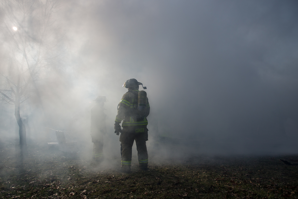  A fire fighter gets engulfed by smoke from a structure fire on Scully Road in Webster Township on Friday, March 10, 2017. The fire completely destroyed the home and a nearby field caught on fire. The cause of the fire is still under investigation. M