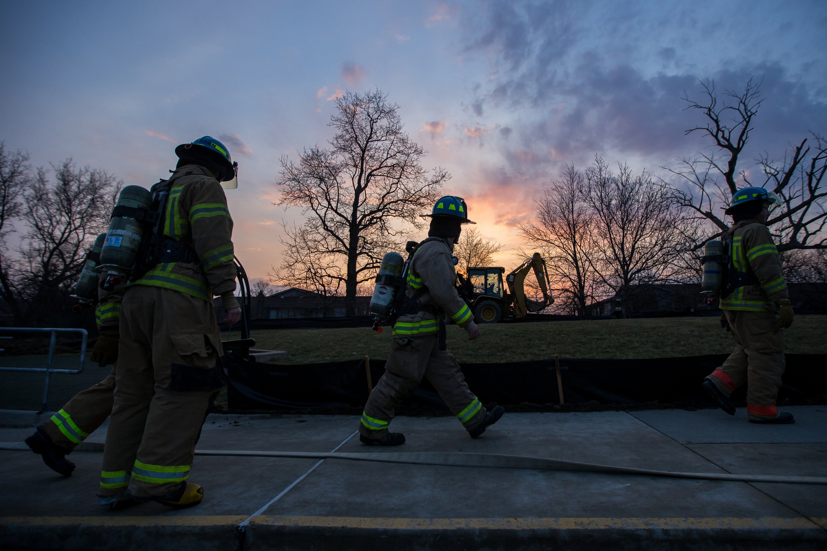  Howell High School Firefighter cadets walk to a building for the beginning of a training exercise as part of the Howell High School Firefighter Academy program on Friday, March 24, 2017. The academy provides students with the proper training to take