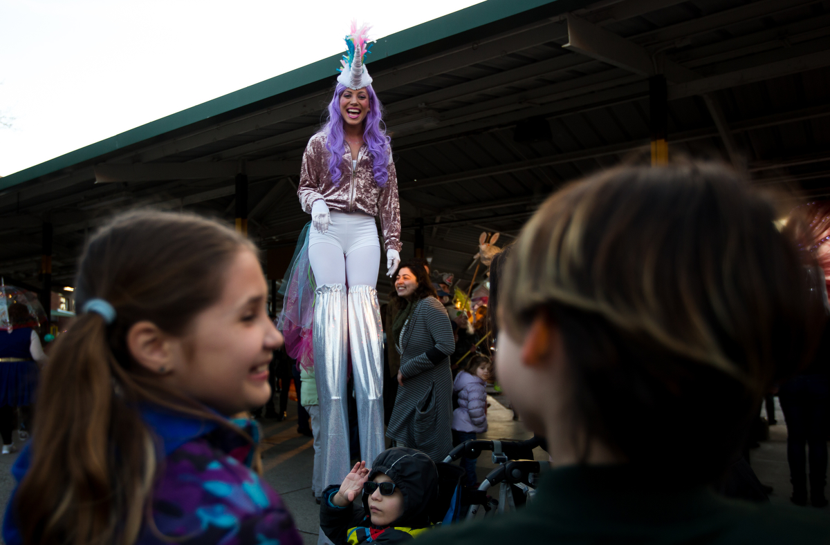  Courtney Merta smiles at children as they scream with excitement to see her during the FoolMoon gathering on Friday, April 7, 2017. FoolMoon, part of a weekend of events, features beer gardens, music, art installations and luminaries made by hundred