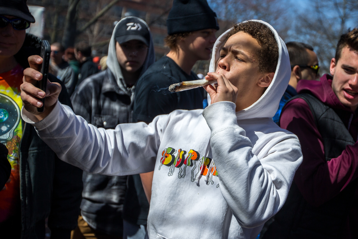  Preston Carter takes a selfie while smoking a joint at the University of Michigan for the 46th annual Hash Bash on Saturday, April 1, 2017. Hash Bash began in 1972 and each year has gotten bigger and pushed to legalize marijuana. Matt Weigand | The 