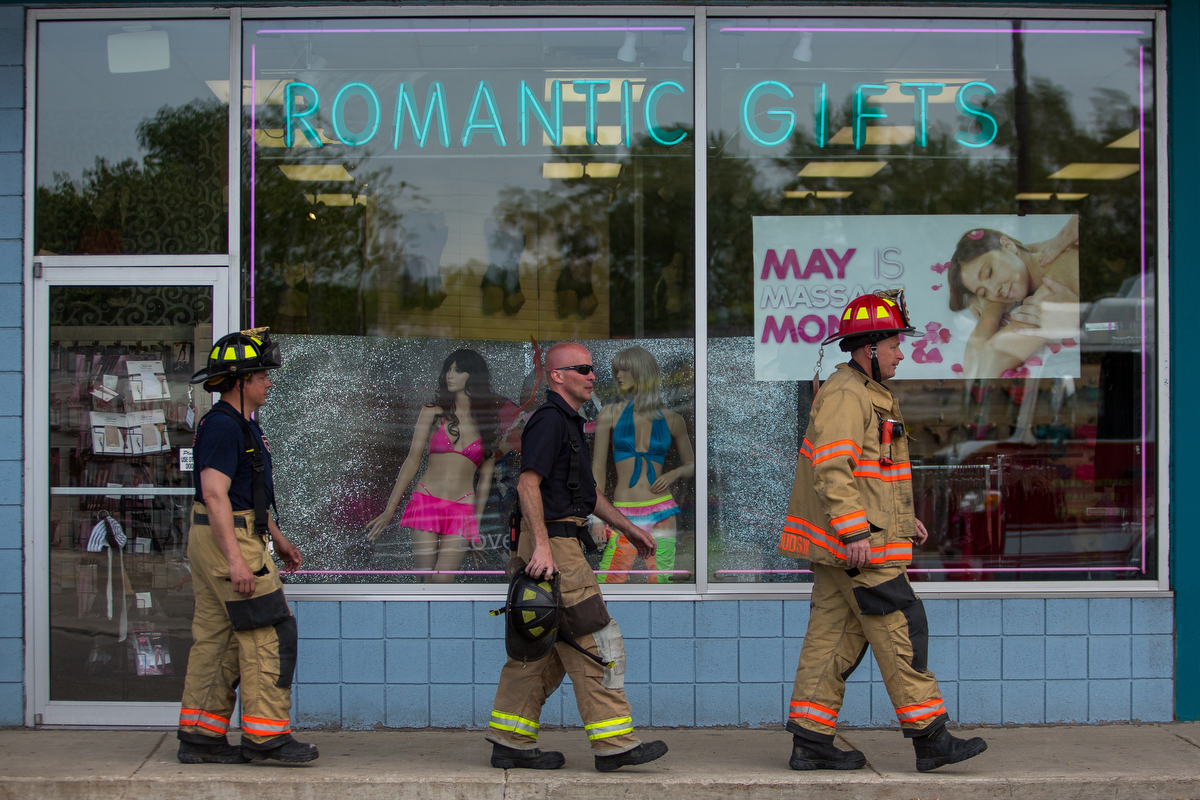  Multiple fire departments respond to reports of smoke at Lovers Lane adult store on Washtenaw Avenue in Ypsilanti on Wednesday, May 17, 2017. The incident is still under investigation. Matt Weigand | The Ann Arbor News 