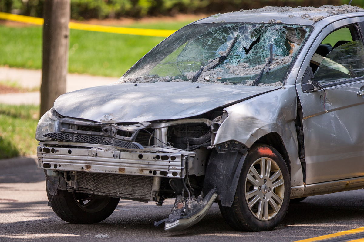  Emergency crews respond to 1900 block of Washtwnaw Avenue after a Ford Focus, driven by a 35 year-old male, crashed into the house on Tuesday, July 18, 2017. The driver of the car died and the cause of the accident is under investigation. Matt Weiga