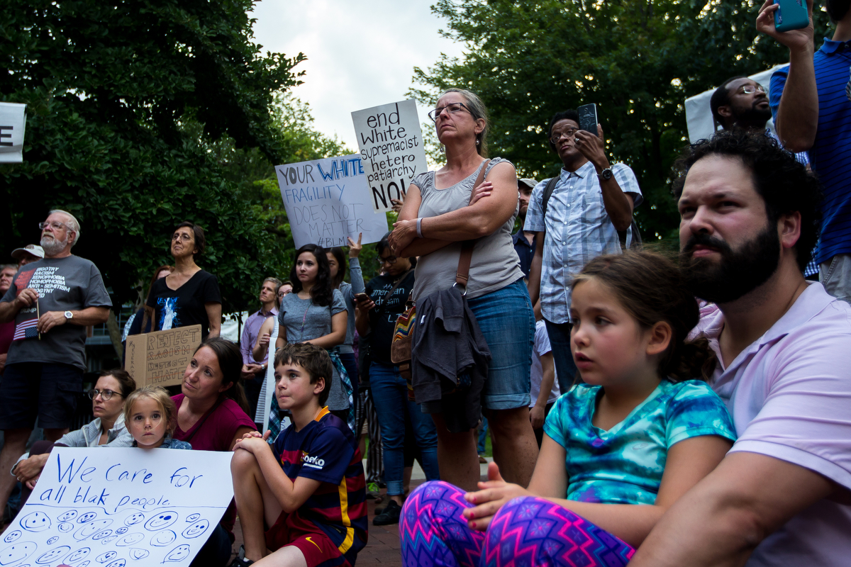  People come together for a gathering to stand in solidarity with the counter-protesters and victims of the protests and attacks in Charlottesville, VA that occurred on Saturday, August 12 while at the Diag at the University of Michigan on Sunday, Au