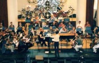 John Wilson conducts the Sinfonia of Westminster at rehearsal for the Concordia international gala showcase, 2 October 1997