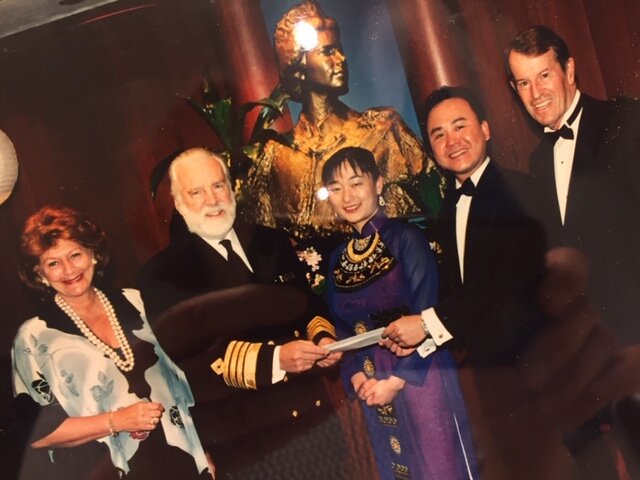 QE2 Phuong receives Concordia prize from Captain Warwick.jpg