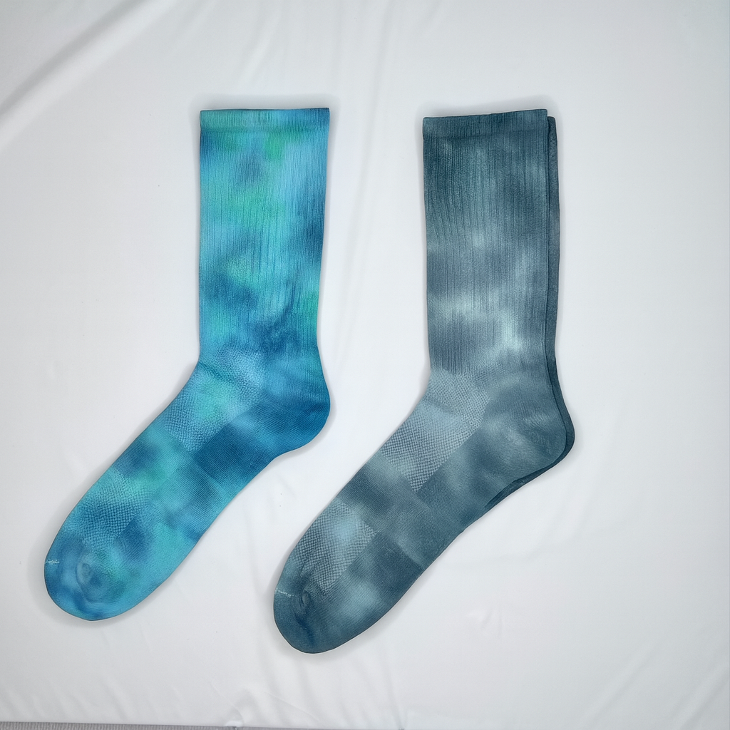 Tie-Dyed Socks on White Fabric.png