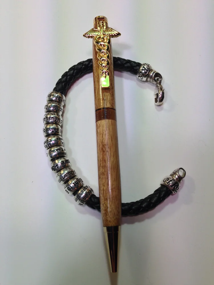 Teak 24K Cadeuceus A.jpg
