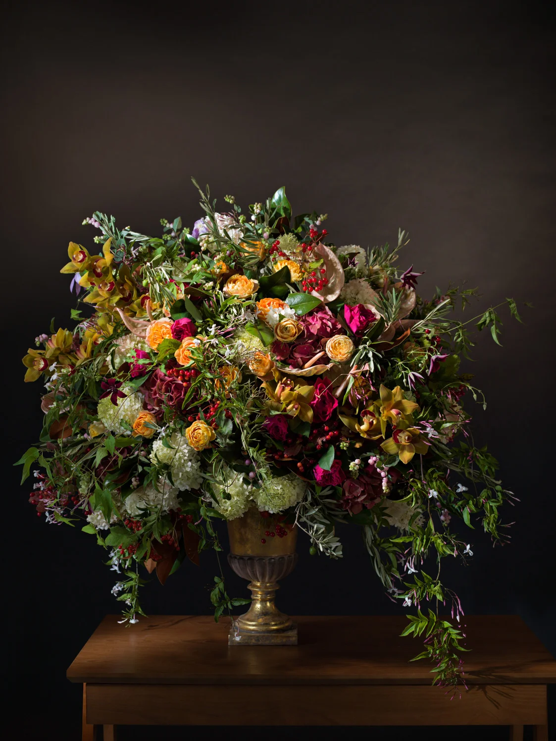 Hydrangeas, roses, anthurium, cymbidium orchids, viburnum berries, olive branches, clematis vine, & jasmine vine